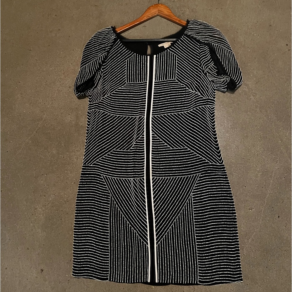 Renzo + Kai women's beaded dress size medium. Used a few tines. Great condition!